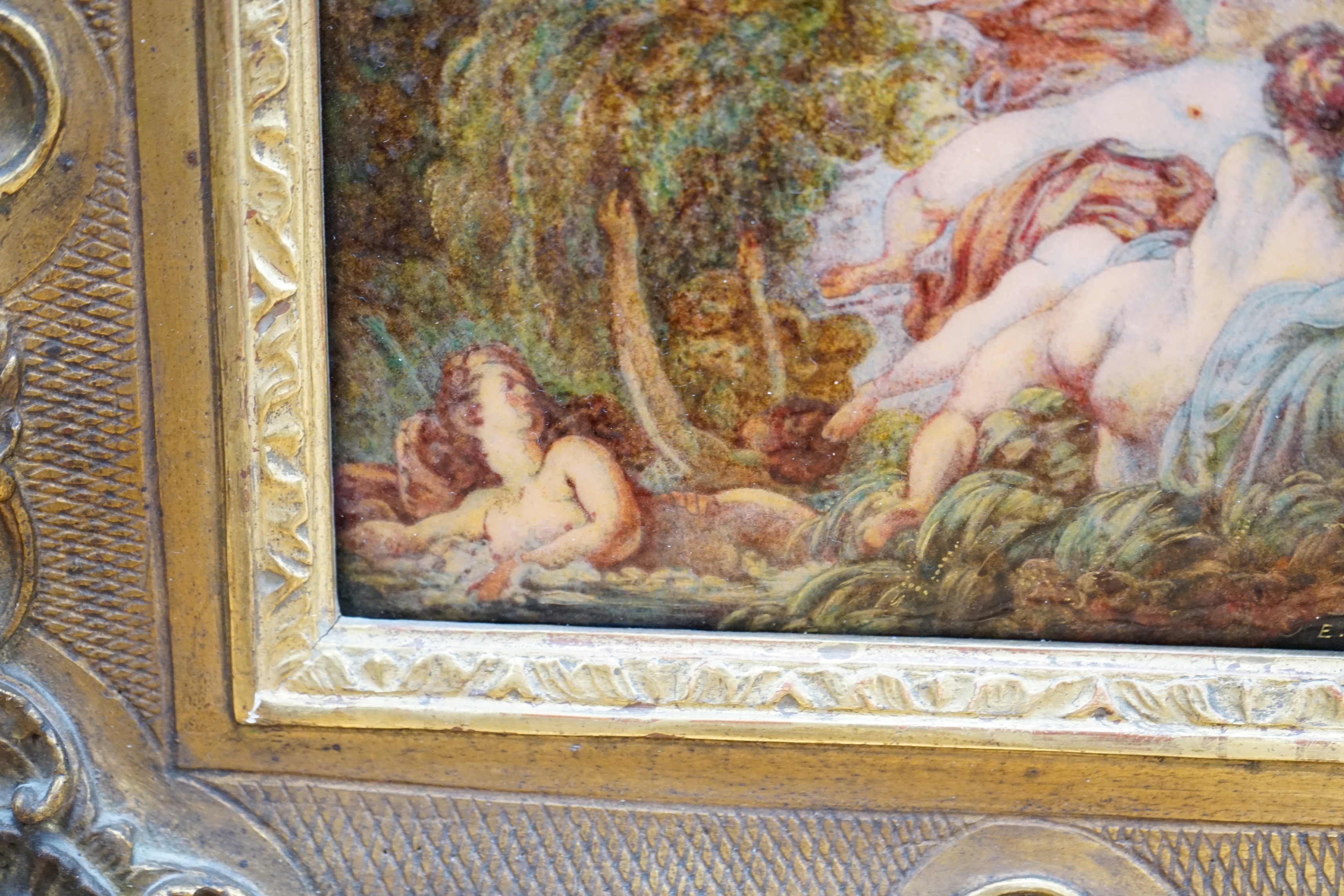 Ernest Blancher (1855-1935) After Jean-Honoré Fragonard (French, 1732-1806) Limoges convex plaque enamelled with nude females amongst foliage, signed, French 1923 Exhibition label verso, 17 x 23cm, ornate gilt framed